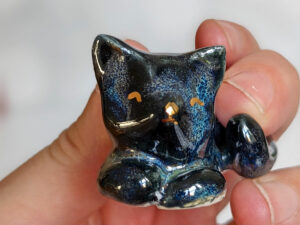 cosmic cat figurine