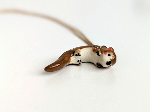 porcelain otter pendant