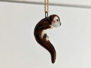 adorable porcelain otter pendant