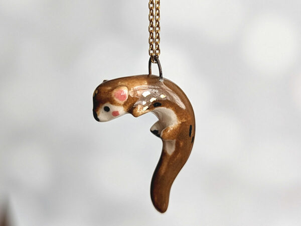 porcelain otter pendant