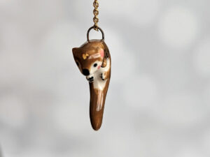 porcelain otter pendant