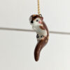 adorable porcelain otter pendant