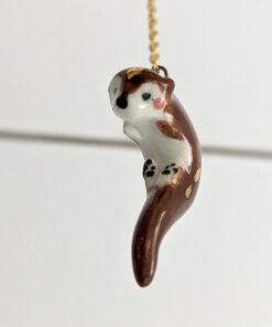 adorable porcelain otter pendant