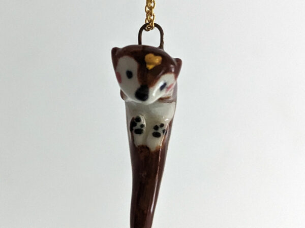 adorable porcelain otter pendant