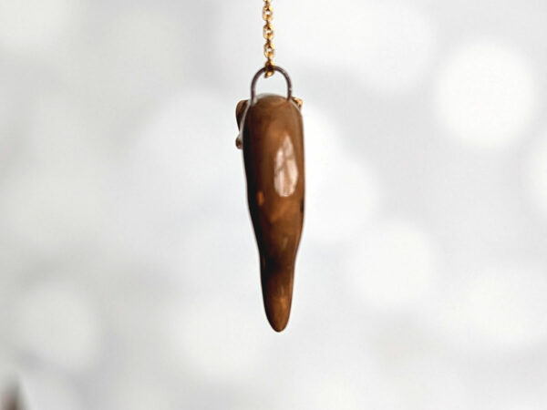 porcelain otter pendant