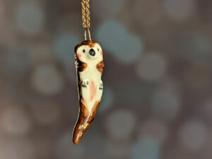 porcelain otter pendant