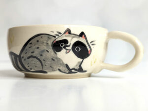 stoneware handmade tea cup raccoon