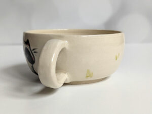 stoneware handmade tea cup raccoon