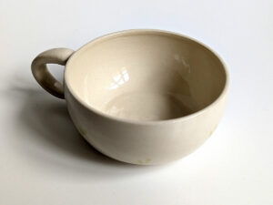 stoneware handmade tea cup raccoon