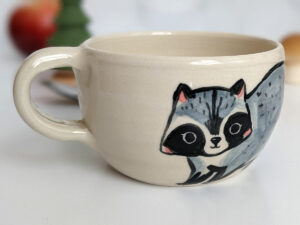 stoneware handmade tea cup raccoon
