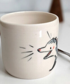 white porcelain opossum tumbler