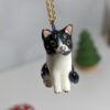 commission pet portrait necklace for a tuxedo cat