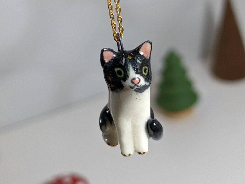 commission pet portrait necklace for a tuxedo cat 