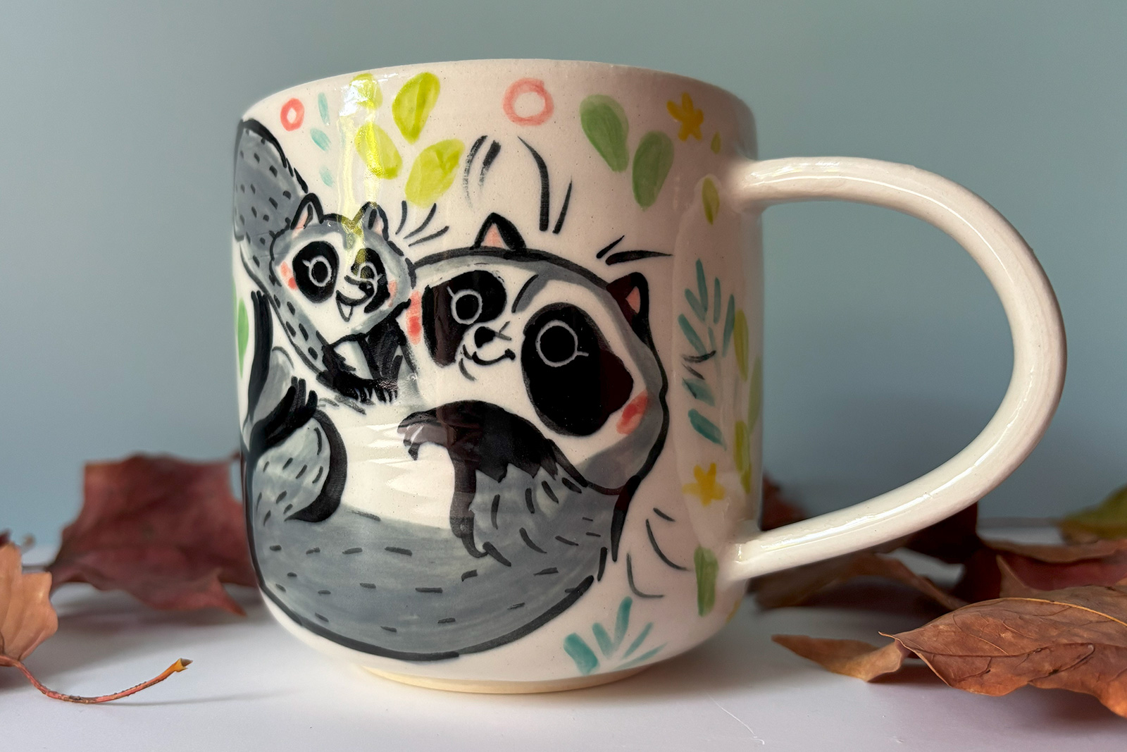 cute raccoon family mug