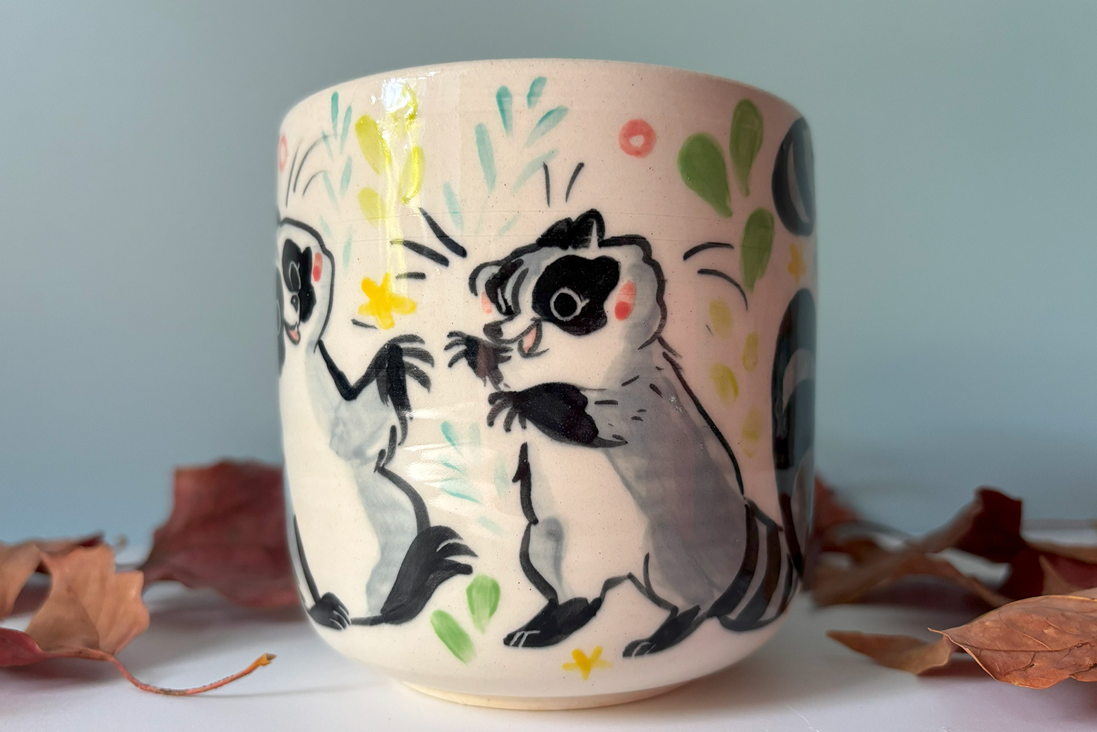 cute raccoon family mug
