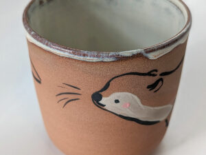 otter cup red clay white glaze cute ceramics kness