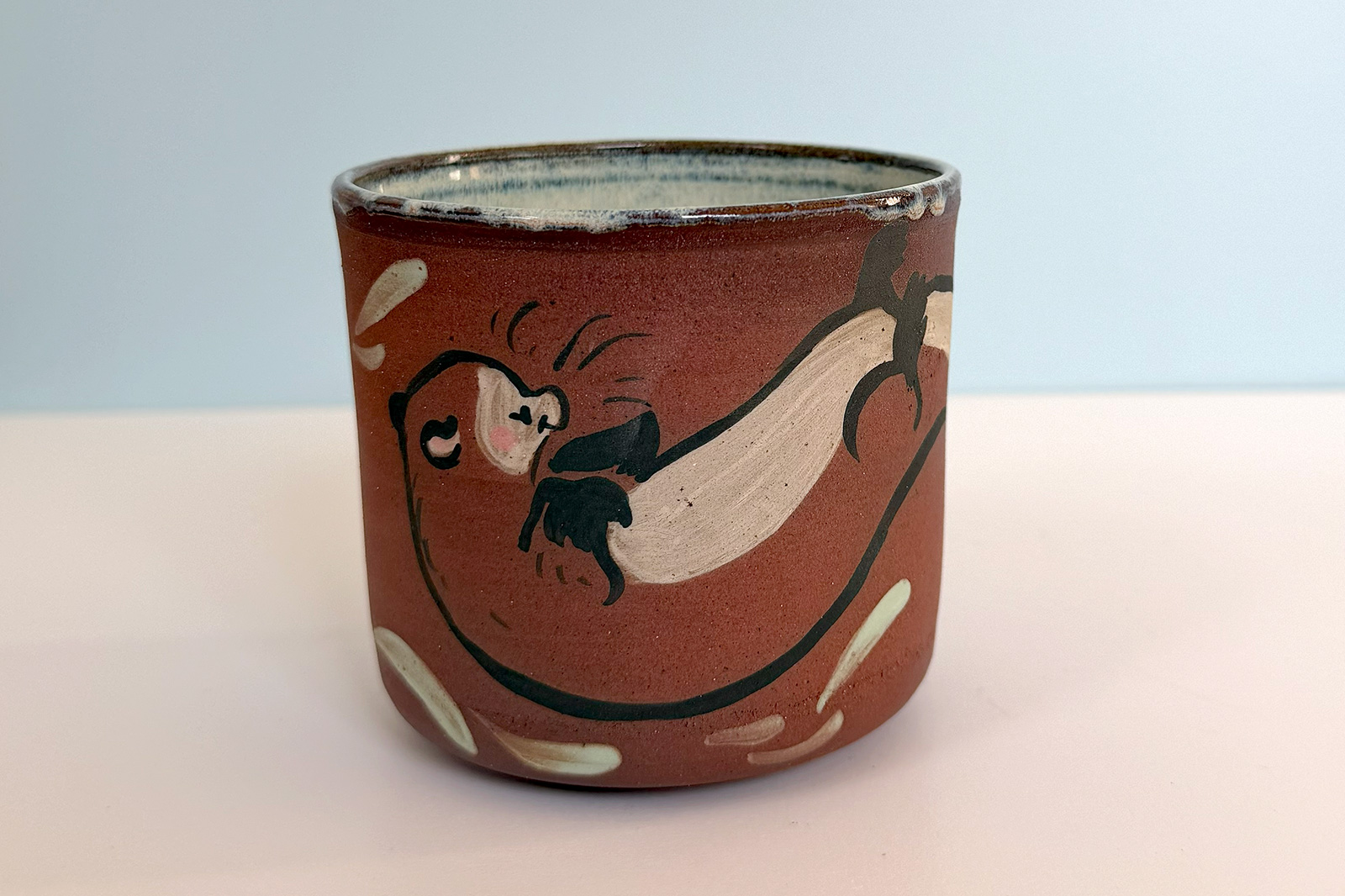 otter cup red clay white glaze cute ceramics kness