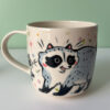cute mug handmade pottery by kness raccoon family