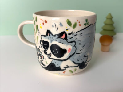 mug raccoon family