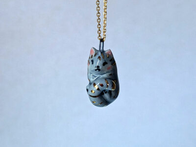 Adorable sleepy cat porcelain pendant