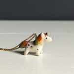 adorable porcelain pendant unicorn with rainbow mane and tail, gold, handmade, one of a kind by kness