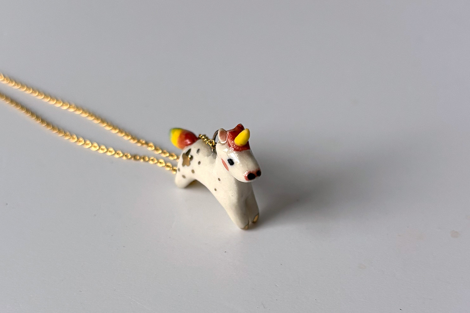 Alternative view of Pendentif Porcelaine - Licorne Arc-en-ciel