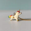 adorable porcelain pendant unicorn with rainbow mane and tail, gold, handmade, one of a kind by kness