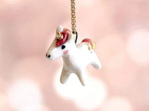 adorable porcelain pendant unicorn with rainbow mane and tail, gold, handmade, one of a kind by kness