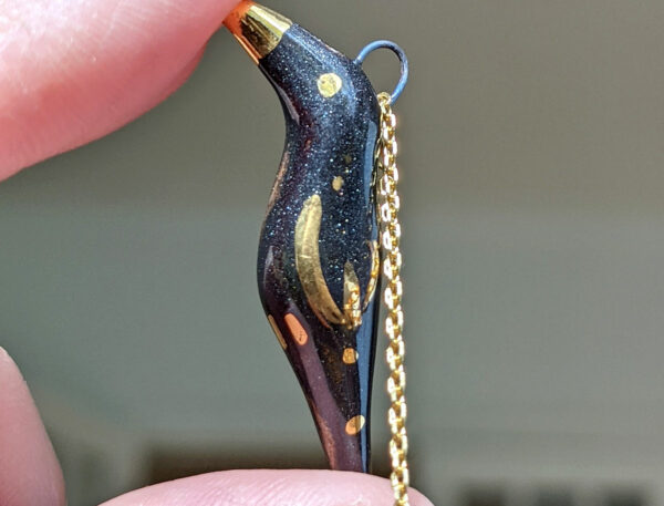 porcelain pendant crow gold