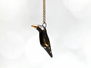 porcelain pendant crow gold