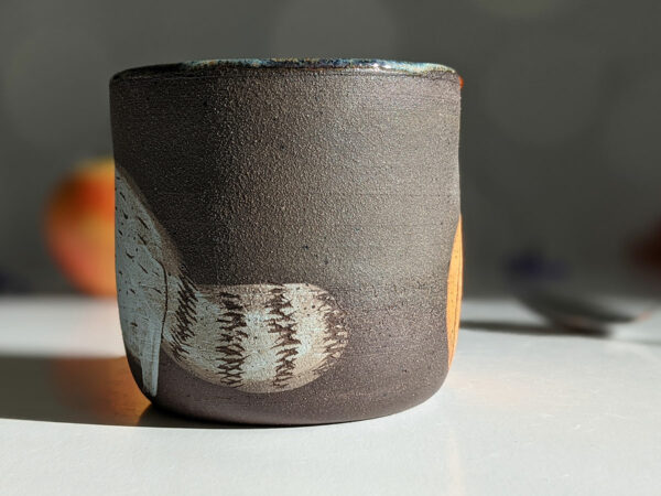 raccoon cup black clay