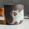 raccoon cup black clay