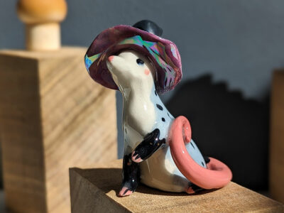 opossum witch figurine