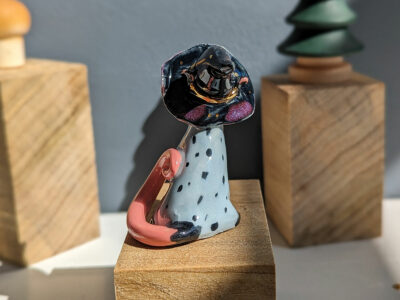 opossum witch figurine