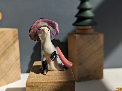 opossum witch figurine