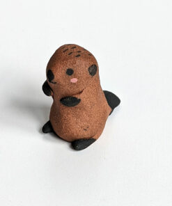 baby beaver figurine