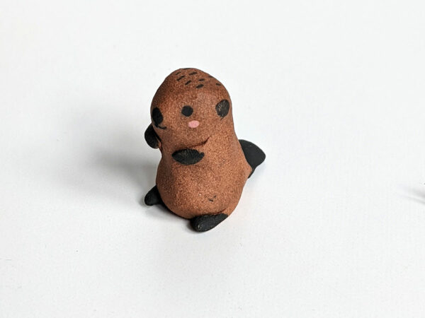 baby beaver figurine