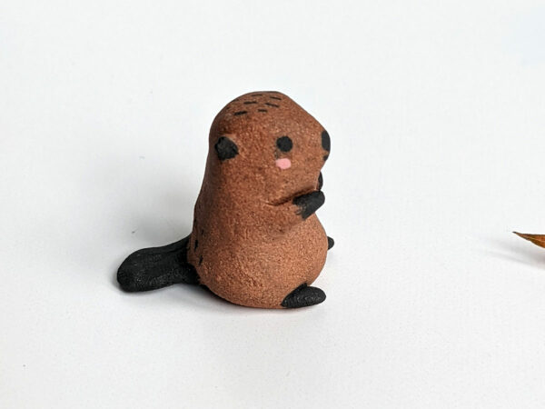 baby beaver figurine