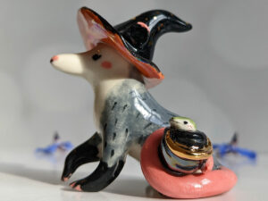 opossum witch figurine