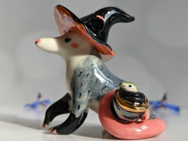 opossum witch figurine