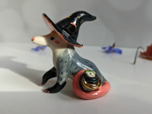 opossum witch figurine