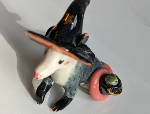 opossum witch figurine