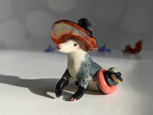 opossum witch figurine