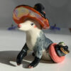 opossum witch figurine