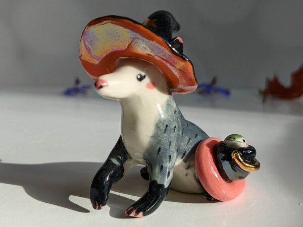 opossum witch figurine