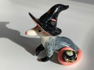 opossum witch figurine