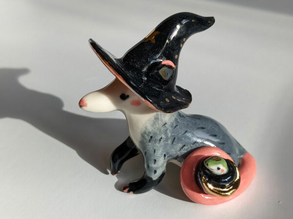 opossum witch figurine