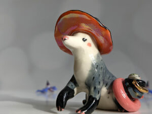 opossum witch figurine