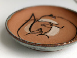 cute otter catch all red clay