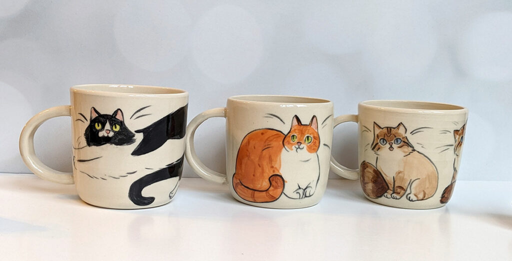 cat portrait on mugs